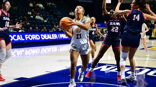 Caia Elisaldez breezes past Samford defense for easy layup