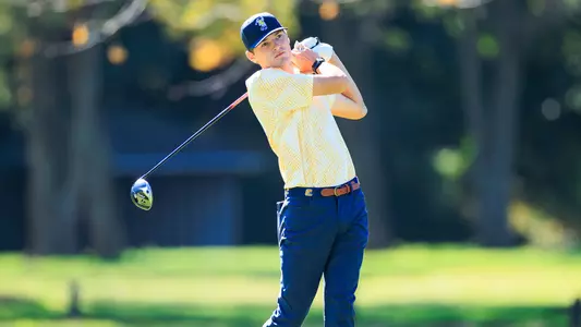 Carson Johnson completes his swing on a drive at Kentucky