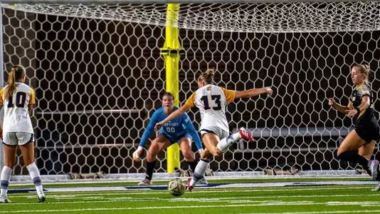 Paige Thomas shoots goal