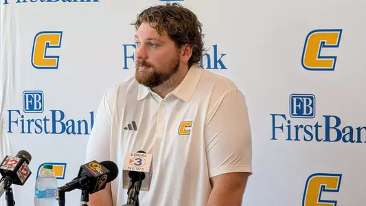 Ryan Merklinger answers questions at the weekly press conference on Oct. 14, 2025