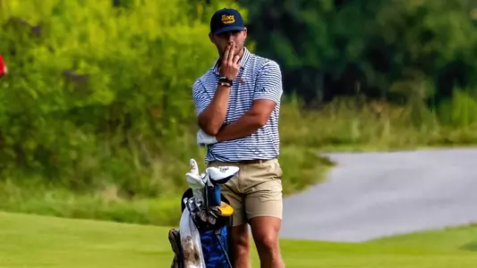 Ward Harris considers his next shot from center cut fairway at the Honors