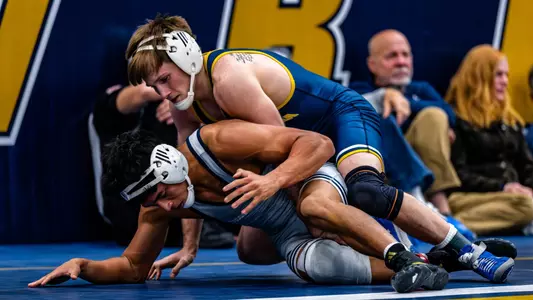 Hunter Mason works on top of Yuta Otero in the Blue-Gold Challenge Series