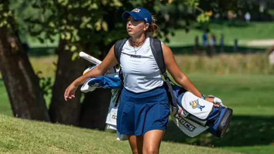 Giulia Foresta pauses while carrying her bag at Vanderbilt as she approaches the green