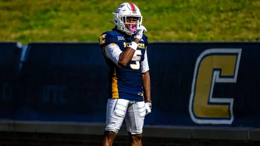 Wide receiver Josh Williams poses with the hush finger after his 66-yard TD reception against Furman