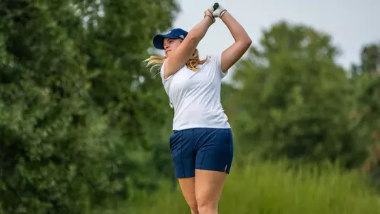 Kera Healey finishes her swing and tracks her shot at Vandy