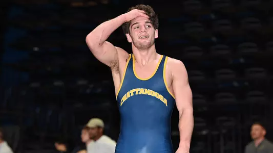 Jackson Hurst smiles with his hand on his forehead after a big win on day 1 of the Southern Scuffle