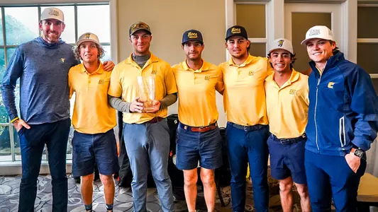 Team poses for trophy pic. From left to right: Coach Blaine Woodruff, Camden Braidech, Garrett Engle, Braedon Wear, Ethan Whitaker, Aidan Cohl & Asst. Coach Ryan Hogan