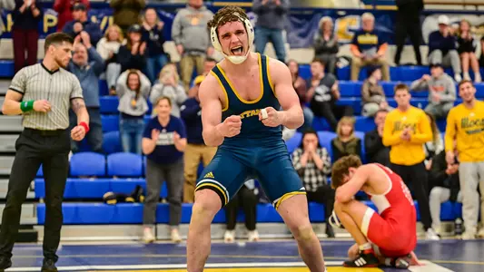 Landon Jones has the double fist celebration after his titanic win over Gardner-Webb