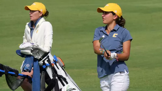 Violeta Fernandez-Tagle holds her pose on her approach to the green with Coach Colette Murray watching alongside her.