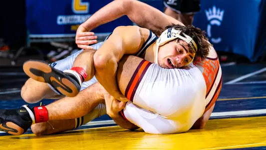 Sergio Desiante completing his shot in a takedown to 4th-ranked Lennox Wolak at the Scuffle