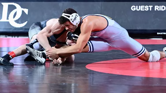 Noah Castillo fends off an attack in a dominating ranked win at Davidson