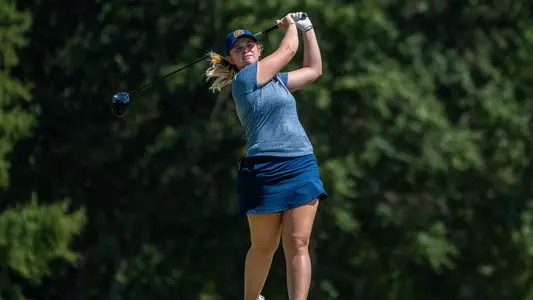 Kera Healey stares intently as her drive lofts down the fairway at Vanderbilt