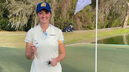 Chloe Stevenazzi poses green side after her 1st career ace in round 2 of the Gators Invitational