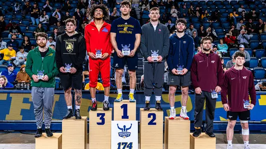 Sergio Desiante stands atop the Southern Scuffle podium at 174.