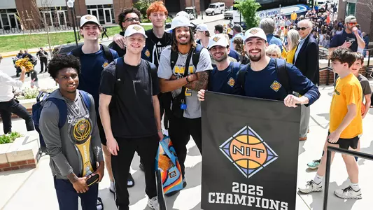 The 2025 NIT Champions at the welcome home gathering in front of McKenzie Arena