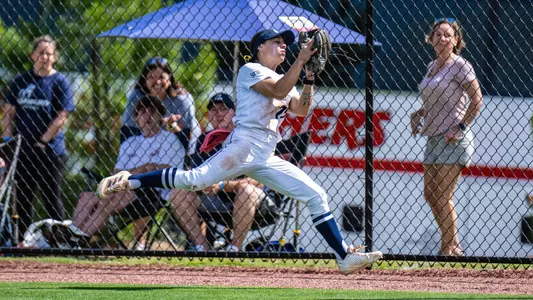 Camryn Cernuto catches ball in outfield
