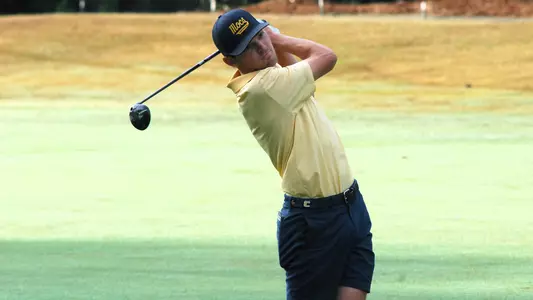 Carson Johnson goes for the green in two to open his round at the SoCon Championships