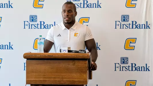 Zion Rutledge speaks to the media at the week one press conference.