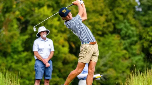 Evan Rogers completes his swing and stares at the flight as it finds the fairway at the Honors