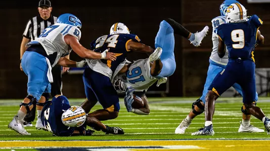 Myles Mays (94) & Kam Baah-Slay (23) upend The Citadel runner