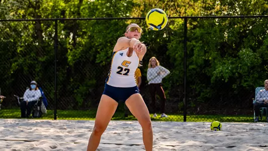 Madison LaRue passes the ball to her teammate against Ten. Tech