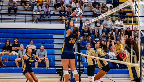Ashley Reynolds setting up a UTC player against Wofford