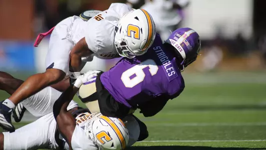 Defense makes another crunching tackle on a Western Carolina receiver.
