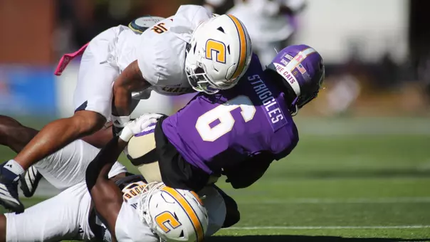 Defense makes another crunching tackle on a Western Carolina receiver.