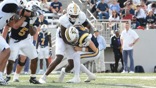 Orlando Daniels provides a crushing blind-side hit in a first half sack at ETSU