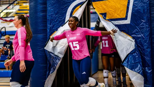 Destiny Wiggins coming out of the tunnel for last year's Dig Pink Match