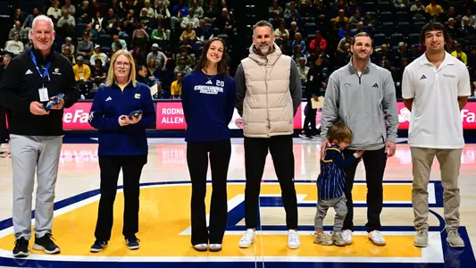 2026 Dayle May Awardees Kendrick Curtis & Nicole Solete are joined by their head coaches Kyle Ruschell & Gavin McKinney along with athletic administrators Mark Wharton & Dr. Emily Blackman.