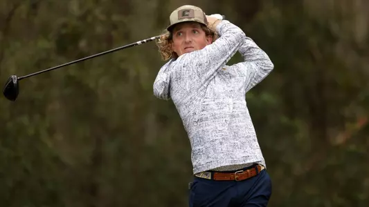 Camden Braidech holds his pose at the top of his drive at the Colleton River Club.