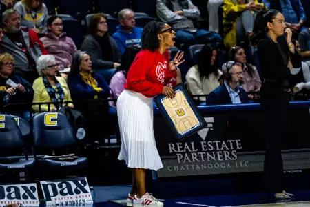 Coach Tianni Kelly