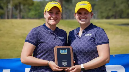 Makenzie Cooper and Kera Healey accept their plaques for finishing tied for 3rd at SoCon Championships