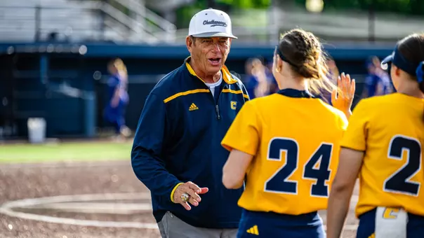 Frank Reed greets Taylor Long after one of his 824 career wins at Chattanooga