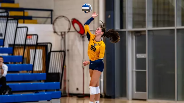 Elena Vukmanov serving in the Blue-Gold Scrimmage