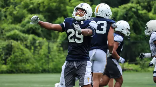 Jaden Nelson celebrates a defensive stop in practice during fall camp 2026