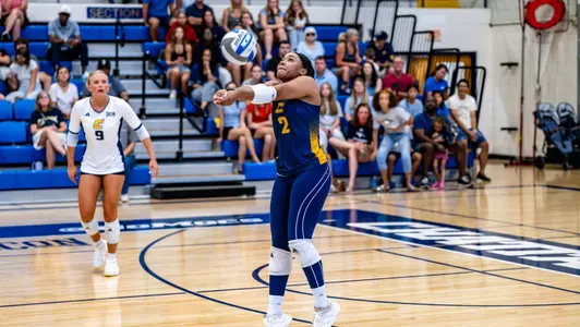 Ryan Oden digging the ball against UAB