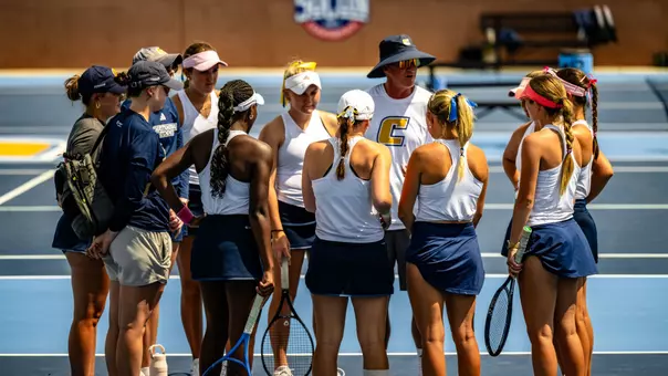 WTEN Chad Camper talking to team.
