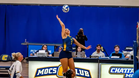 Addison Walker on the attack on the near side of the court