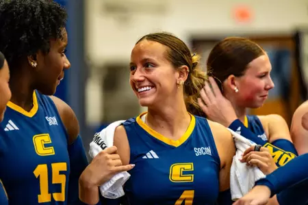 Mallory Merz talks to Destiny Wiggins in between sets