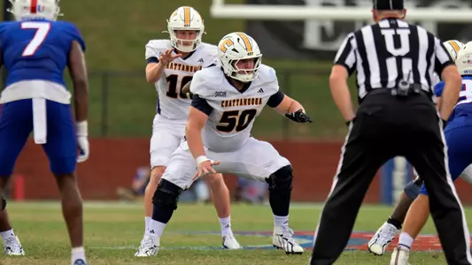 Devin Lively gets in position to block as his snap reaches Battle Alberson in the background at West Georgia.