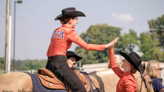 equestrian_high_five