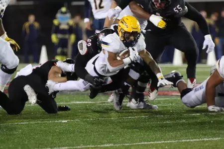 Art Thompkins vs. NIU