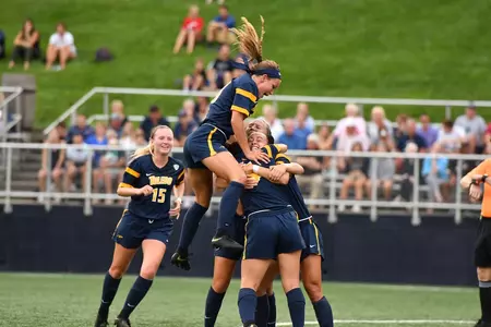 hannah scafaria and team celebrate goal