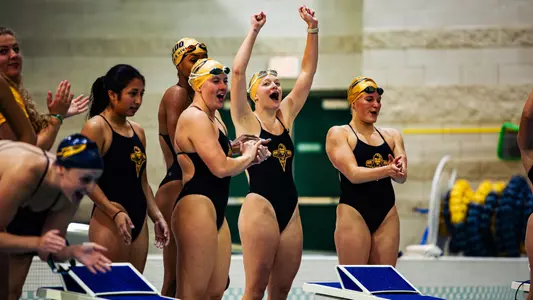 Gold Team Cheering burign SWIM Blue Vs Gold Meet