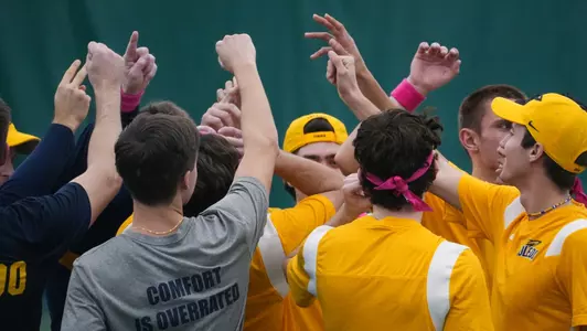 men's tennis huddle