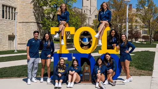 Women's Tennis with TOLEDO sign