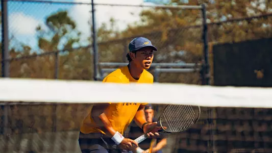 Poonthong Komolpisut awaits a serve