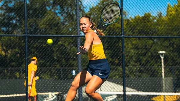 Anastasia Akuginova hitting the ball